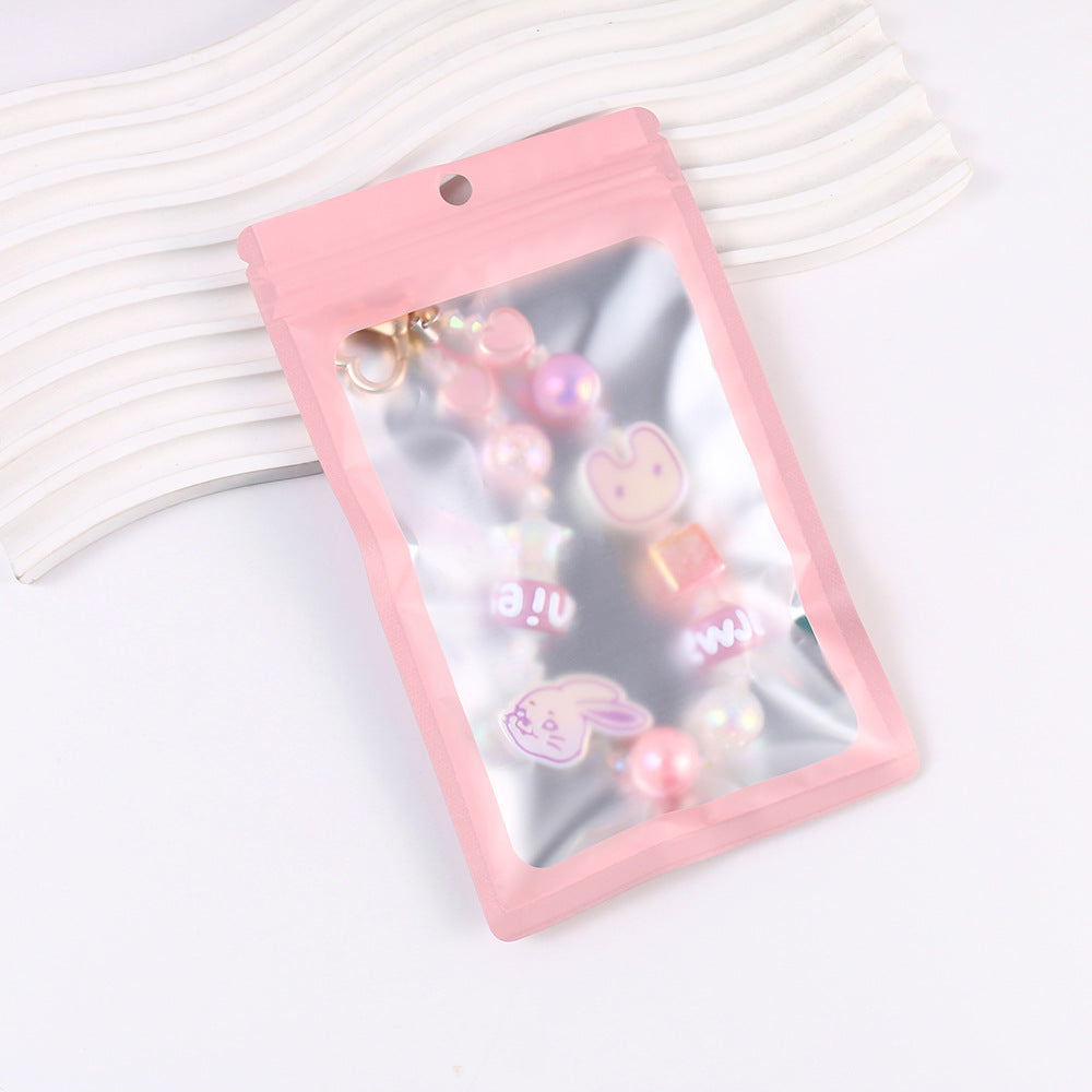 PENDENTIF DE TĂLĂPHONE PORTABLE NEWJEANS